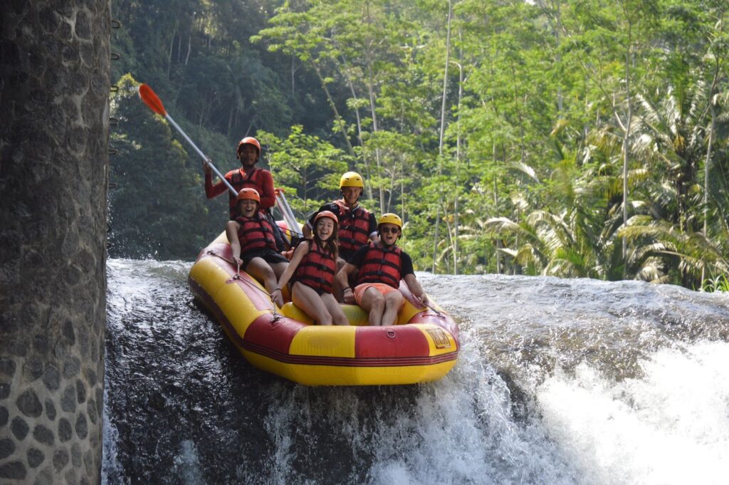Nestled in the tranquil heart of East Bali, far from the bustling cities and tourist crowds, the Telaga Waja River offers an exhilarating white-water rafting experience. Flowing through the lush landscapes of Karangasem, this river is surrounded by breathtaking natural beauty, including sprawling rice terraces, dense tropical vegetation, and the towering backdrop of Mount Agung.