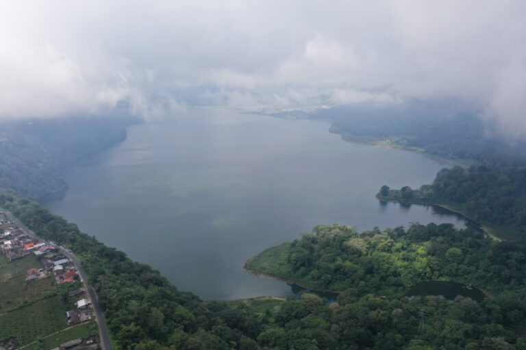 Lake Buyan, A Scenic Retreat of Nature, Adventure, and Cultural Wonders in Bali Nestled in Buleleng Regency, Bali, Lake Buyan is a breathtaking natural attraction and the largest of three twin lakes formed within a vast caldera.