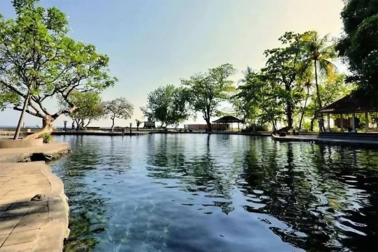 Discover the Serenity of Air Sanih: A Natural Spring Paradise in Buleleng, Bali Located in Desa Yeh Sanih, Kubutambahan, Buleleng, this natural spring offers crystal-clear, cool waters surrounded by lush tropical gardens, making it a refreshing retreat for both body and soul.